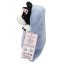 Top Model black and white plush dog in a blue sleeping bag