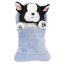 Top Model black and white plush dog in a blue sleeping bag