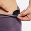 Běžecké legíny Nike Dri-FIT Swoosh - Farbe: Violett, Größe: M