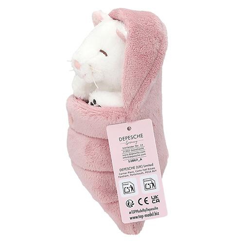 Top Model white plush cat in a pink sleeping bag